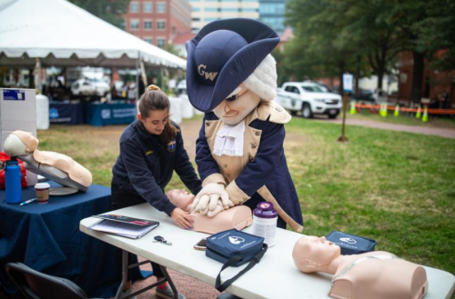 GW Mascot 'George' learning CPR
